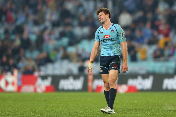 SYDNEY, AUSTRALIA - JULY 13:  Berrick Barnes of the Waratahs reacts after missing a field goal during the round 20 Super Rugby match between the Waratahs and the Reds at ANZ Stadium on July 13, 2013 in Sydney, Australia.  (Photo by Cameron Spencer/Getty Images)